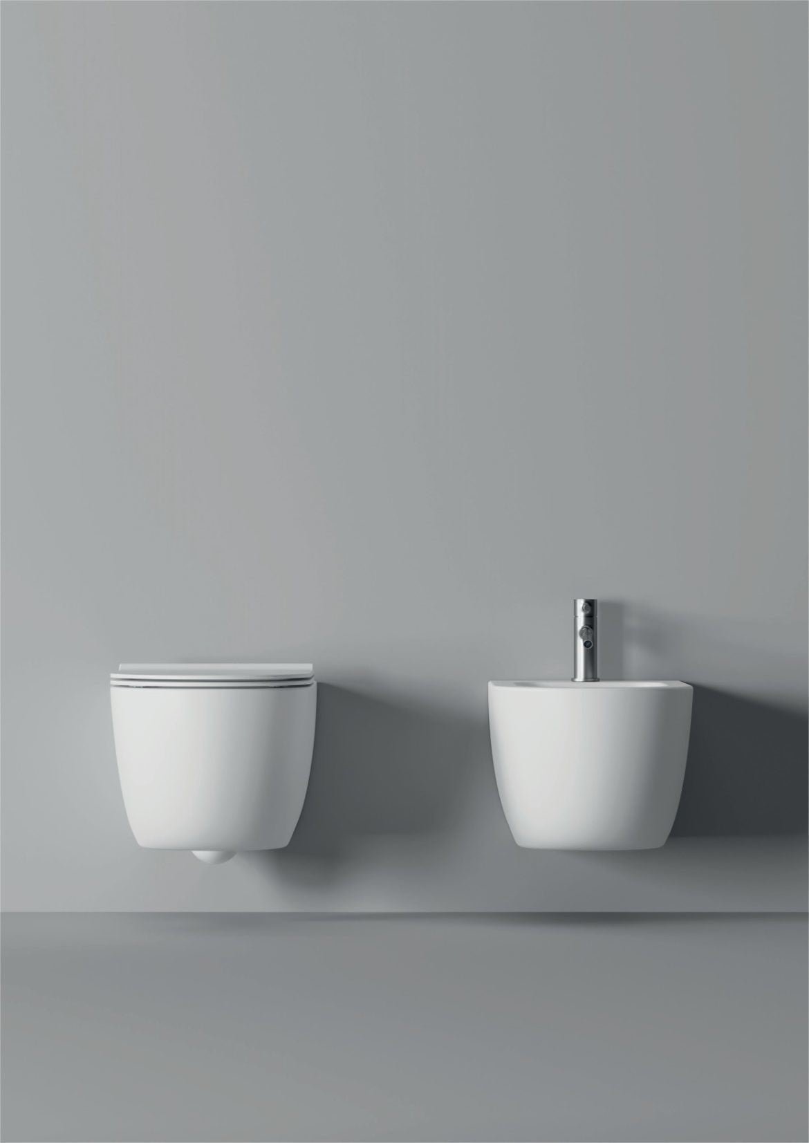 Coppia sanitari sospesi serie UNICA 50 senza brida con sedile softclose