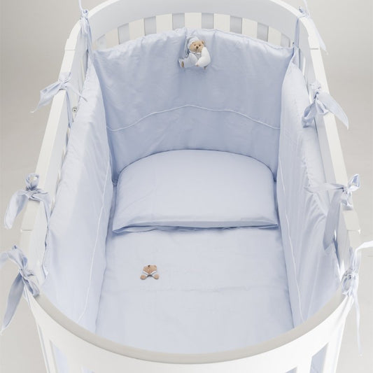 4-teiliges Bettwäsche-Set mit Stoßstange für ovales Babybett Puccio Azzurro