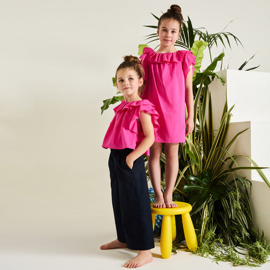 Blusa fucsia con frappe