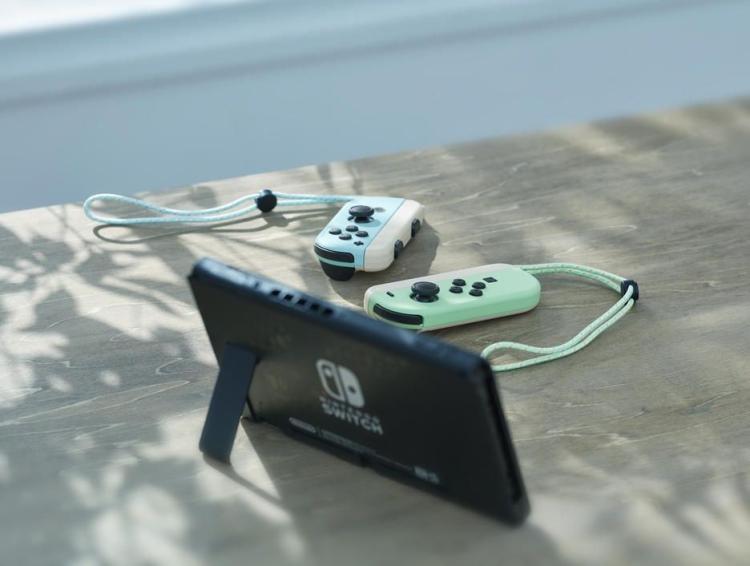 Nintendo Switch Handheld-Konsole 1.1 + Animal Crossing: New Horizons Sonderedition