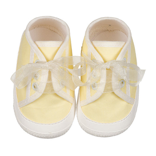 Sneakers gialle con fiocco