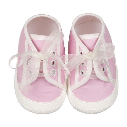 Rosa Sneakers mit Schleife