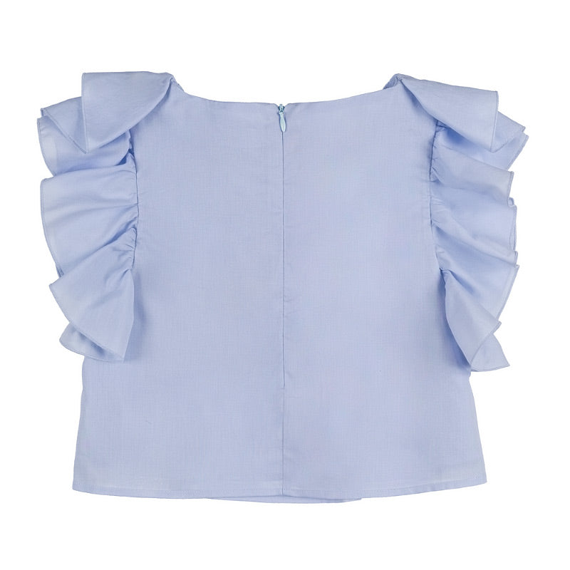 Blusa azzurra con frappe