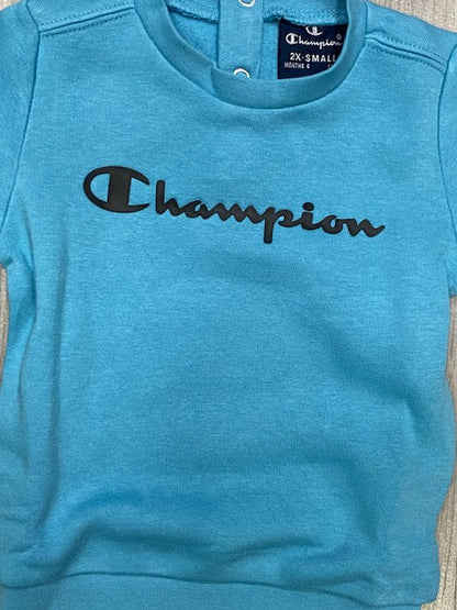 Champion tuta infant con felpa con bottoncini al collo e pantalone con polsino 306186 BS157 DLPB/NBK celeste-nero