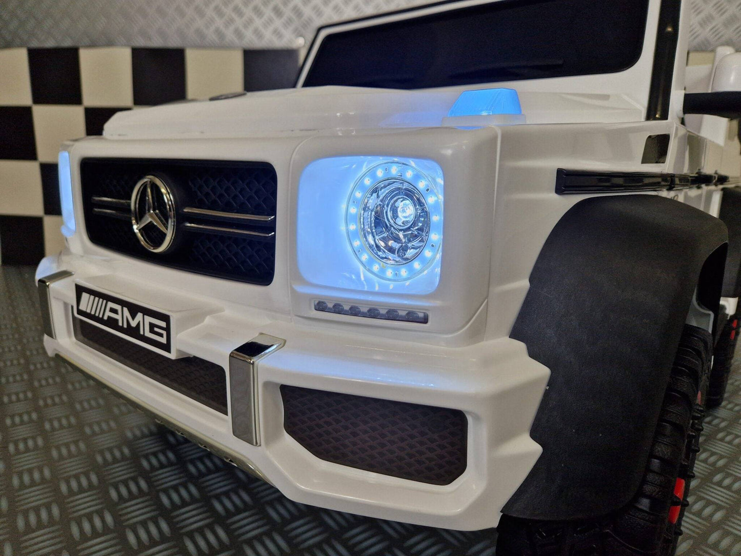 Kinder-Elektroauto Mercedes G63 AMG 6×6 12 V – Weiß