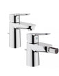 Pair of Grohe Bauedge basin and bidet mixers in brass
