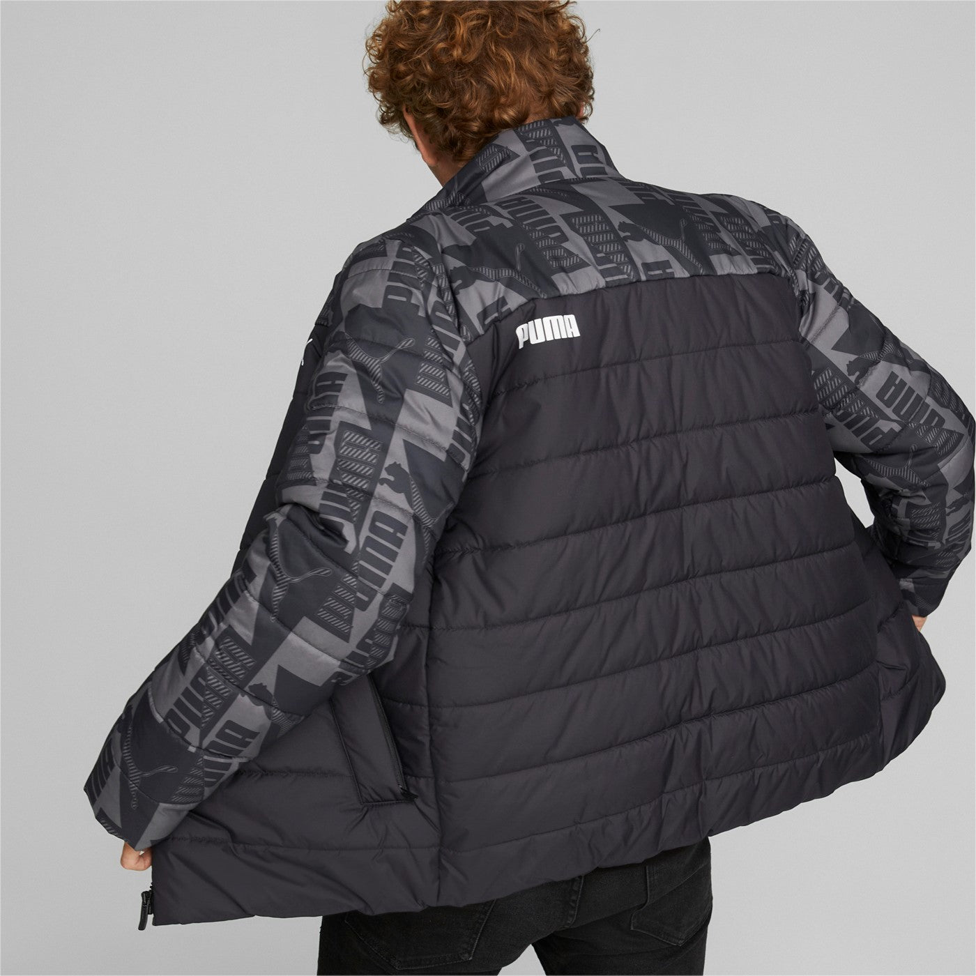 Puma Giacca da uomo trapuntata e stampa ESS Padded AOP Jacket 849347 01 nero