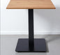 Restaurant table with central iron pedestal and melamine top with ABS edge