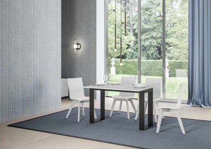 Tavolo apribile Tecno Double con diverse rifiniture