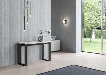 Tavolo apribile Tecno Double con diverse rifiniture