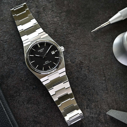 Tissot PRX Powermatic 80 T137.407.11.051.00 – Orologio automatico nero 40 mm, fondello trasparente, vetro zaffiro, bracciale acciaio