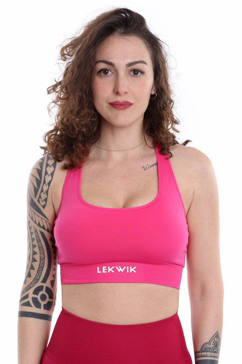 Top sportivo INES intrecciato fucsia